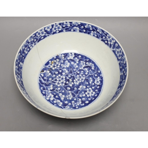 1262 - A Chinese blue and white prunus bowl, 19th century. 26.5cm diameter