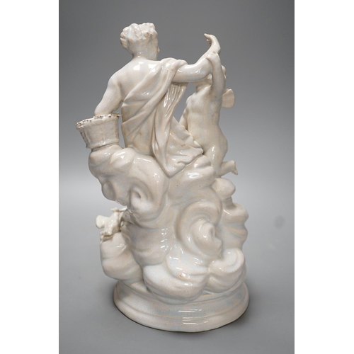 1263 - A 19th century Naples style maiolica group of Venus and Cupid - 26.5cm high