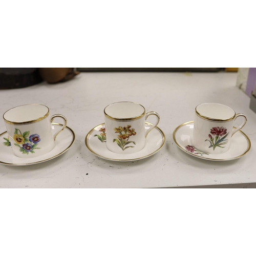 1269 - A Royal Worcester botanical decorated coffee set.