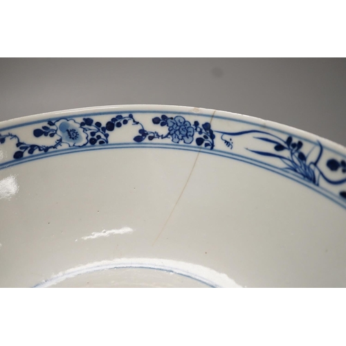 1270 - A 19th-century Chinese blue and white dragon bowl - 27cm diameter