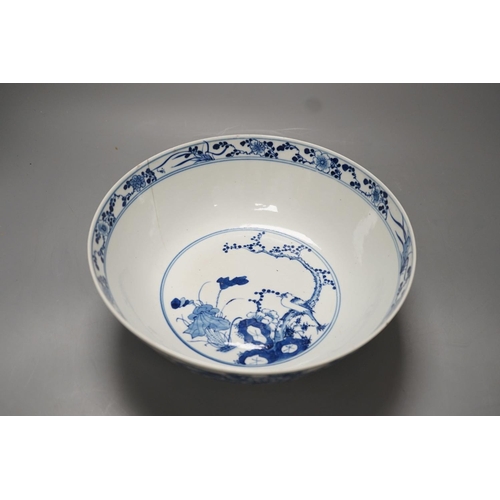 1270 - A 19th-century Chinese blue and white dragon bowl - 27cm diameter