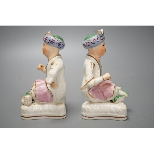 1273 - Two Staffordshire porcelain figures of seated Ottoman Turks - 12.5cm high