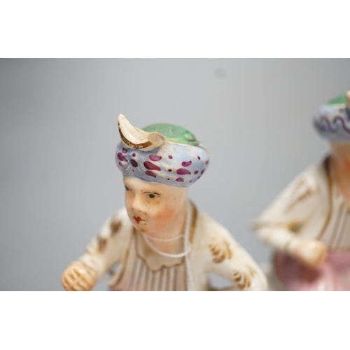 1273 - Two Staffordshire porcelain figures of seated Ottoman Turks - 12.5cm high