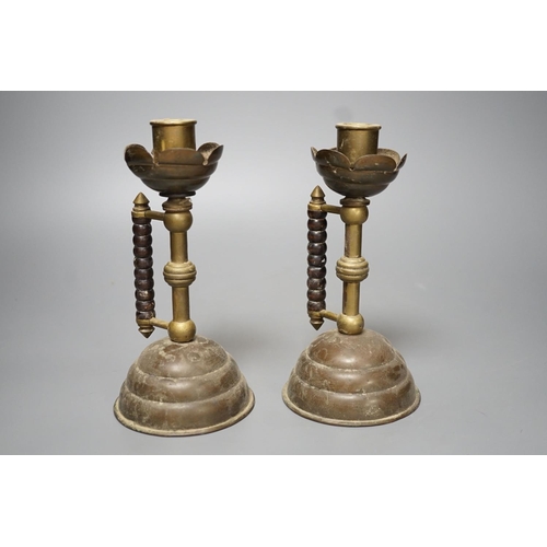 1274 - A pair of Gothic brass stem cup and handled candlesticks - 19.5cm high