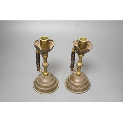 1274 - A pair of Gothic brass stem cup and handled candlesticks - 19.5cm high