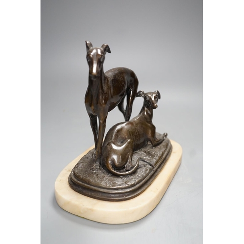 1277 - A bronze sculpture of a greyhounds on alabaster base, one seated and the other standing - 20cm high... 