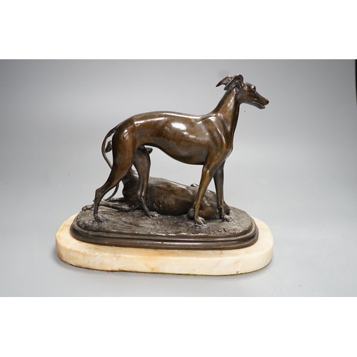 1277 - A bronze sculpture of a greyhounds on alabaster base, one seated and the other standing - 20cm high... 