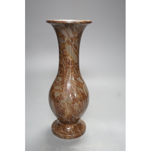 1278 - A pudding stone vase - 28cm high