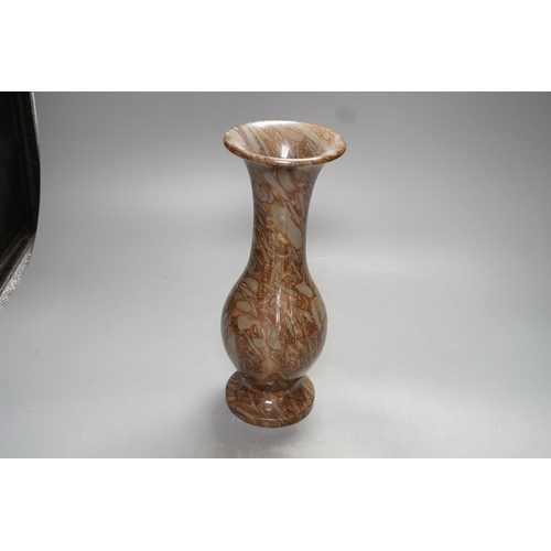 1278 - A pudding stone vase - 28cm high