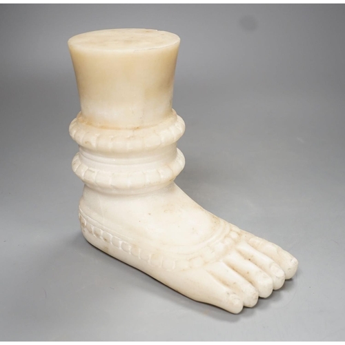 1289 - An Indian white marble foot of a deity - 18cm high