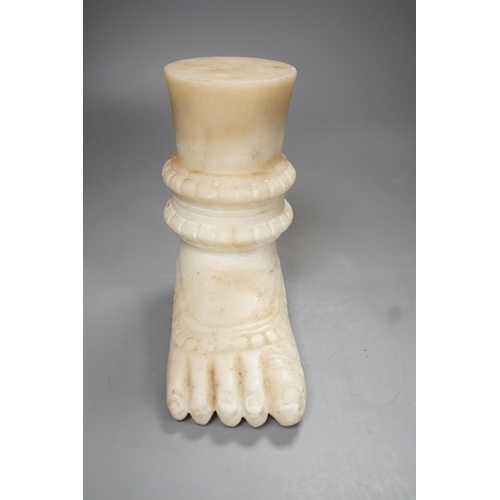 1289 - An Indian white marble foot of a deity - 18cm high