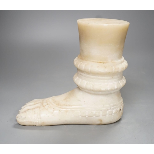 1289 - An Indian white marble foot of a deity - 18cm high