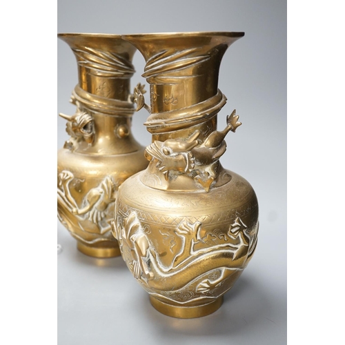 1292 - A pair of Chinese brass dragon vases, 26cm, together with two similar incense burners, tallest 30cm ... 