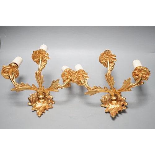 1297 - A pair of ormolu three branch wall lights