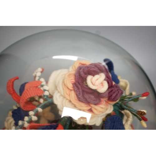 1300 - Victorian woolwork model of a bouquet of flowers under a glass dome - 40cm high