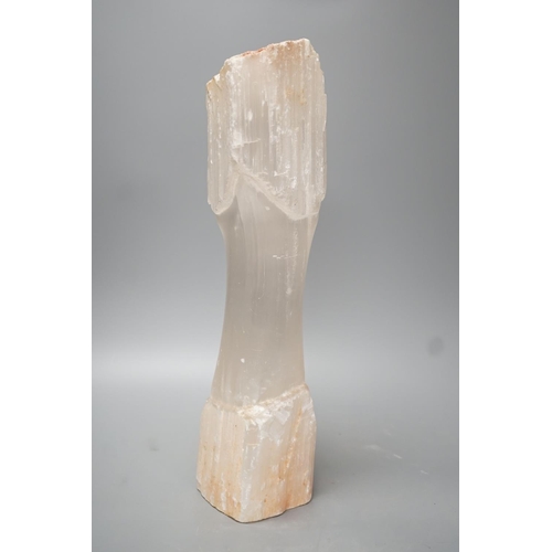 1304 - A carved mineral ornament - 33cm long