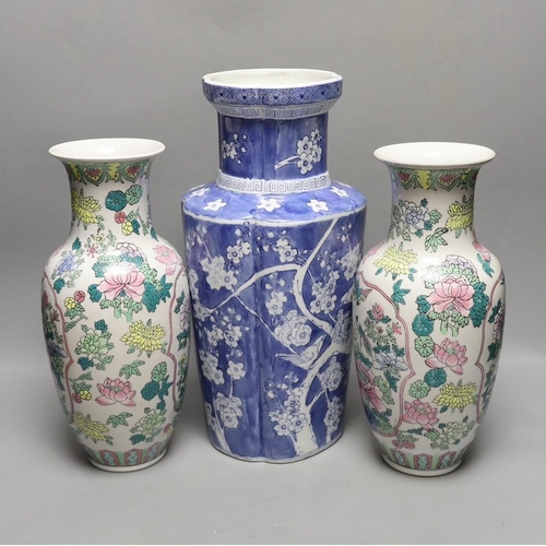 1309 - ° ° A pair of Chinese enamelled porcelain baluster vases and a Chinese blue and white vase. 37cm... 