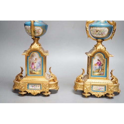 1315 - A pair of Louis XVI style ormolu and Sevres style porcelain candelabra 39cm