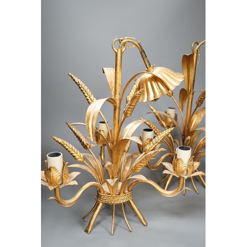 1321 - A pair of gilt metal wheat sheaf three light chandeliers