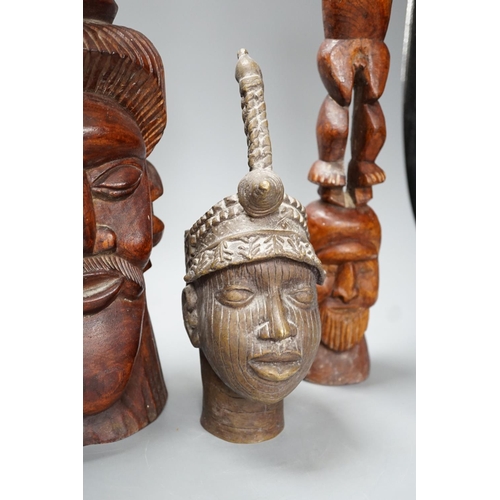 1323 - A metal Benin style bust, a carved tribal bust and another