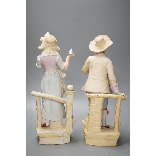 1328 - A pair of bisque figures - 34.5cm