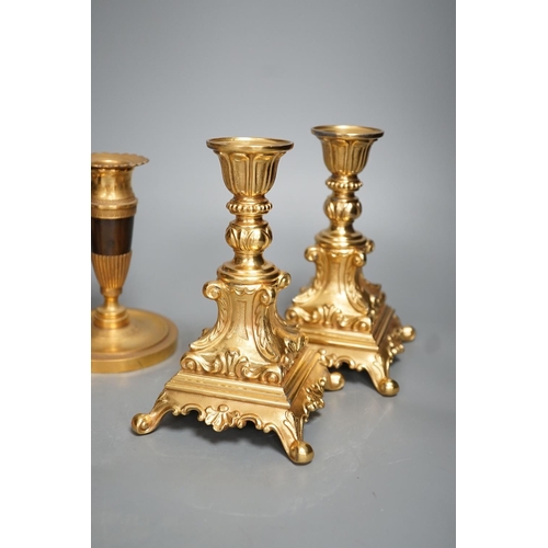 1355 - Three pairs of gilt metal candlesticks, tallest 16cm