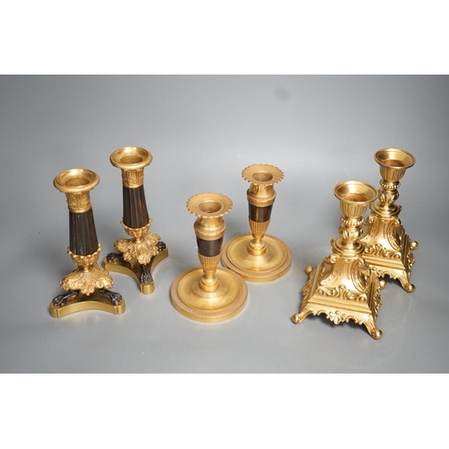 1355 - Three pairs of gilt metal candlesticks, tallest 16cm