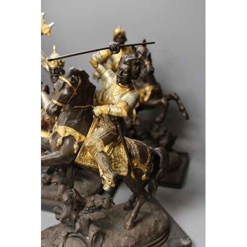 1359 - Three spelter warriors on horseback - tallest 43cm