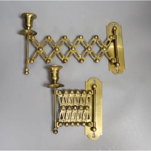 1371 - A pair of brass concertina action candlesticks