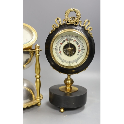 1374 - An ormolu and silver plated hourglass shaped desk aneroid barometer and a gilt metal and parcel ebon... 