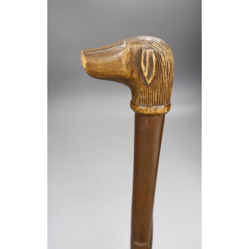 1375 - A Folk art carved dog-head walking cane - 92.5cm