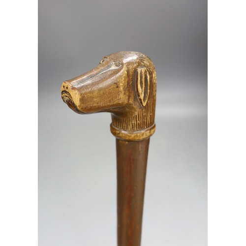 1375 - A Folk art carved dog-head walking cane - 92.5cm