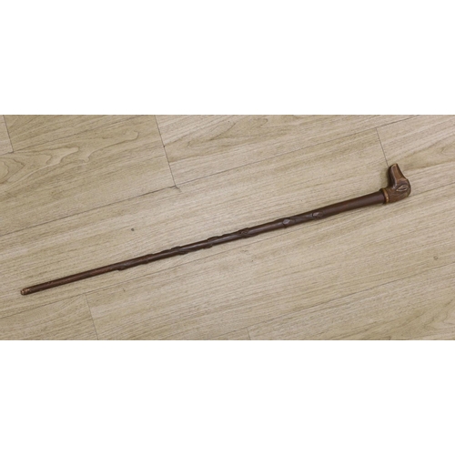 1375 - A Folk art carved dog-head walking cane - 92.5cm