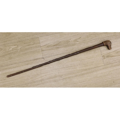 1375 - A Folk art carved dog-head walking cane - 92.5cm