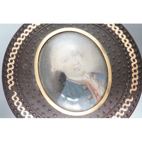 1557 - A 19th century pressed bois durci and gilt metal snuff box with painted miniature portrait of a gent... 