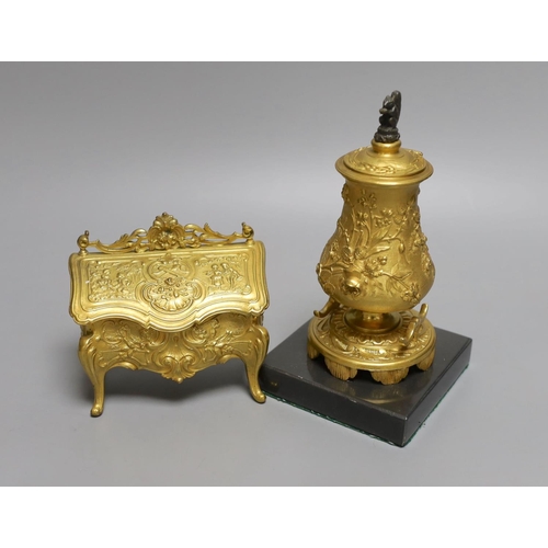 1567 - A novelty gilt metal, serpentine shaped miniature chest inkwell and a similar urn shaped inkwell,Che... 