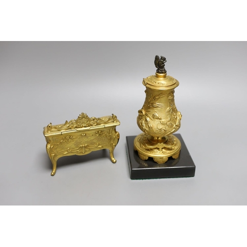 1567 - A novelty gilt metal, serpentine shaped miniature chest inkwell and a similar urn shaped inkwell,Che... 