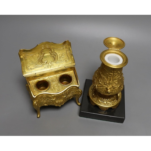 1567 - A novelty gilt metal, serpentine shaped miniature chest inkwell and a similar urn shaped inkwell,Che... 