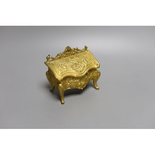 1567 - A novelty gilt metal, serpentine shaped miniature chest inkwell and a similar urn shaped inkwell,Che... 