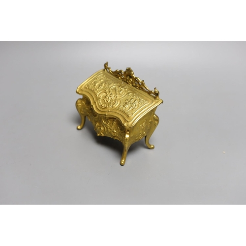 1567 - A novelty gilt metal, serpentine shaped miniature chest inkwell and a similar urn shaped inkwell,Che... 