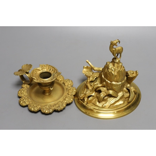 1569 - An ormolu mountainous and figurative inkstand and butterfly handled chamber stick,Inkwell 13cms high... 