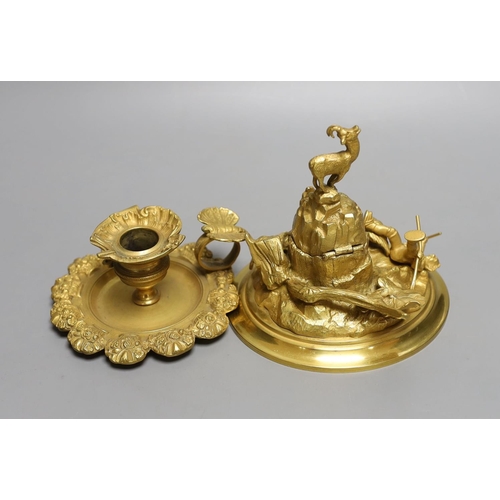 1569 - An ormolu mountainous and figurative inkstand and butterfly handled chamber stick,Inkwell 13cms high... 