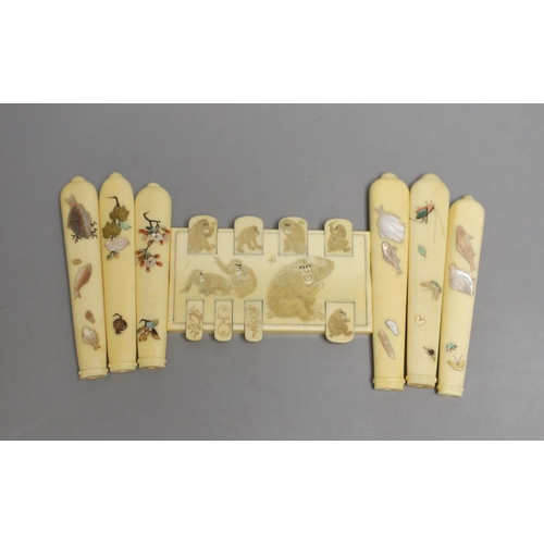 1572 - A carved ivory Japanese bezique marker and six Shibayama style ivory handles, Meiji period marker 9c... 