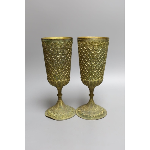 1573 - A pair of ornate gilt metal goblets,22cms high.