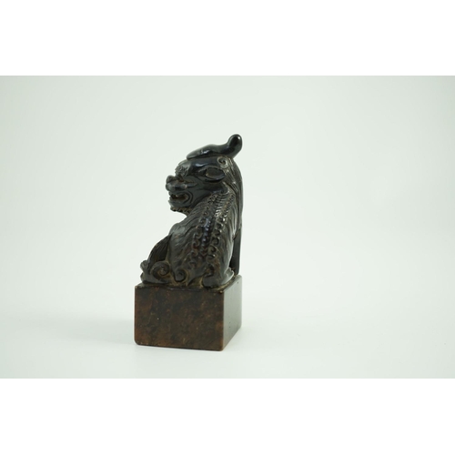 1579 - A Chinese soapstone pixiu (lion dog) seal,9.5 cms high.