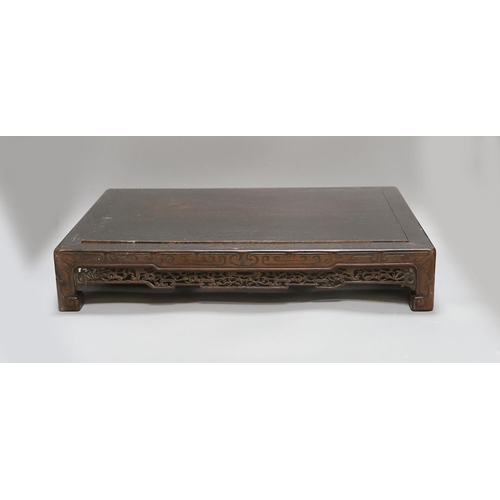 1613 - A 19th century Chinese hongmu low stand - 51cm long