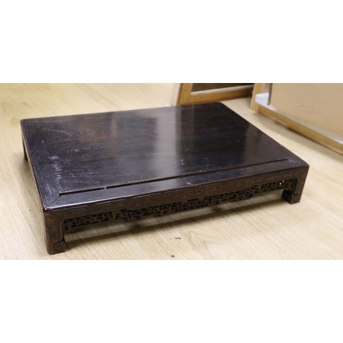 1613 - A 19th century Chinese hongmu low stand - 51cm long