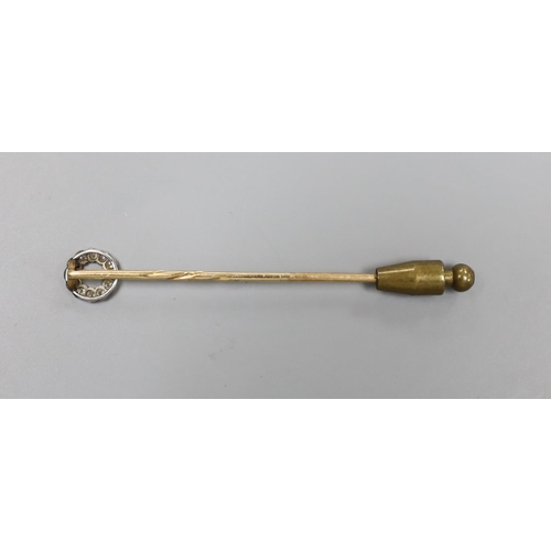 1946 - An Edwardian yellow metal and diamond cluster set stick pin, 58mm, gross 1.4 grams.