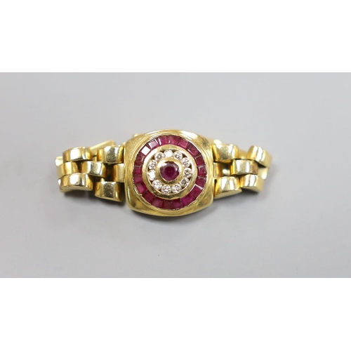 1947 - A modern 750, ruby and diamond circular cluster set ring, with articulated shank and clasp, size S. ... 