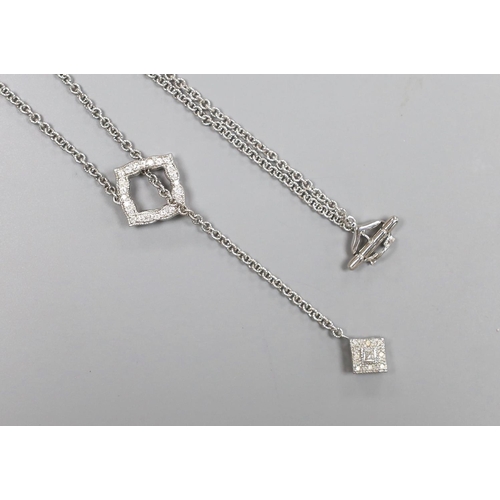 1948 - A modern 750 white metal and diamond cluster set drop necklace, 54cm, gross weight 10 grams.... 